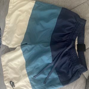 Mens size small blue and white Nike bathing suit